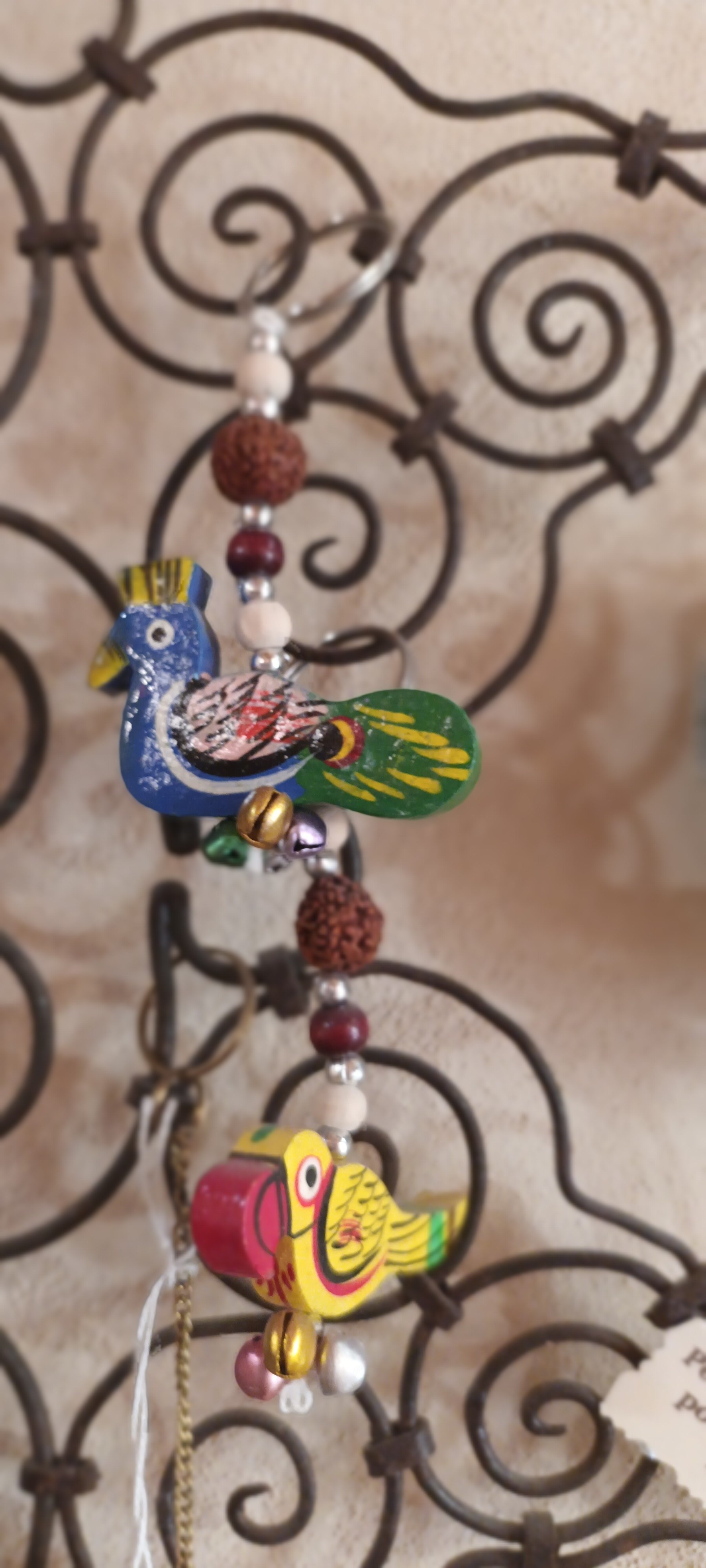 Porte clé Paon et perle de rudraksha 6€