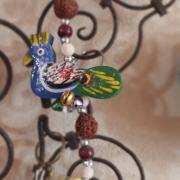 Porte clé Paon et perle de rudraksha 6€