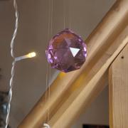 La boule de cristal ronde violette