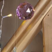 La boule de cristal ronde violette